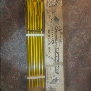 Yellow Precision Arrows by Herter's Inc.